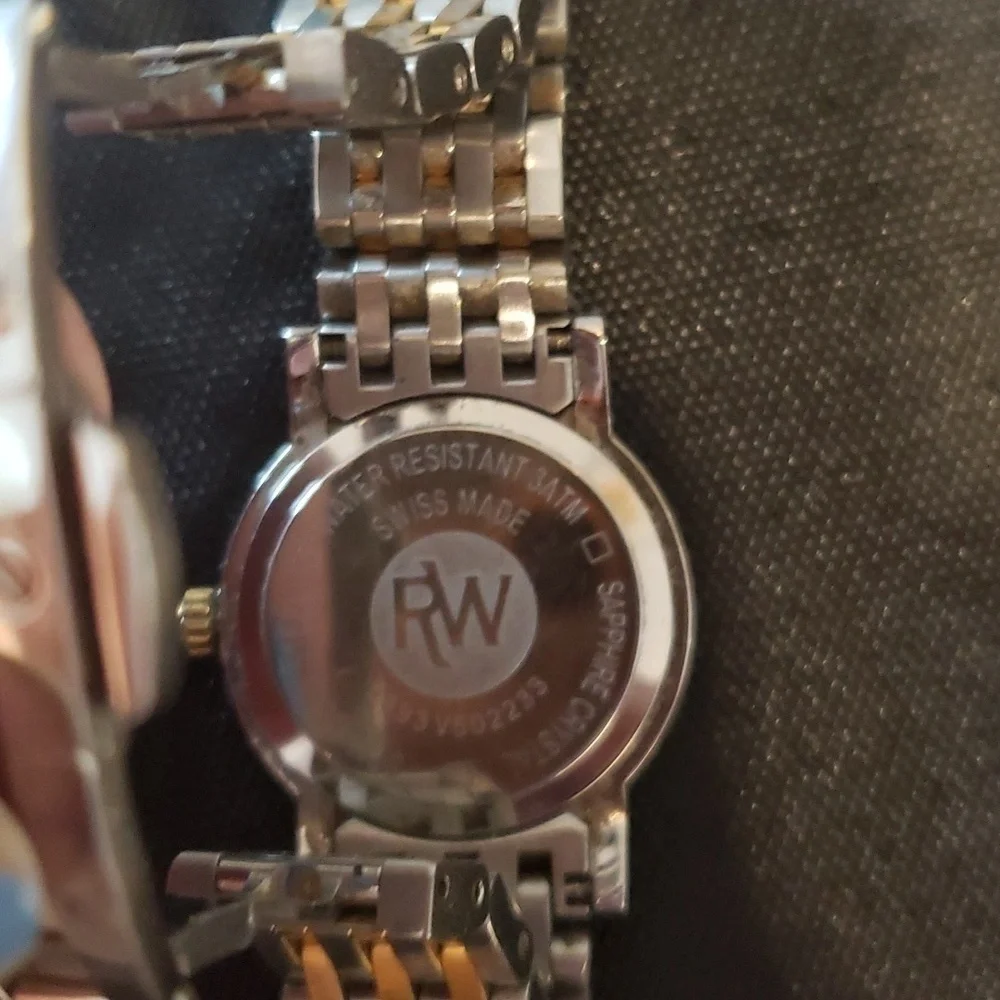 Raymond  Weil Toccata woman's watch with pearl face and Diamond accents.